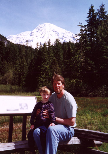 Matt and Bryden in front of Longmire Meadows and Mount Rainier
